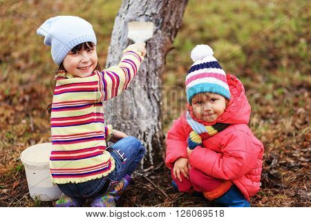 The child in garden happiness outdoors work.