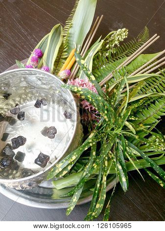 Thai Flowers And Water With Som Poi (acacia Concinna) Water In Tray With Pedestal On Wood Table (use