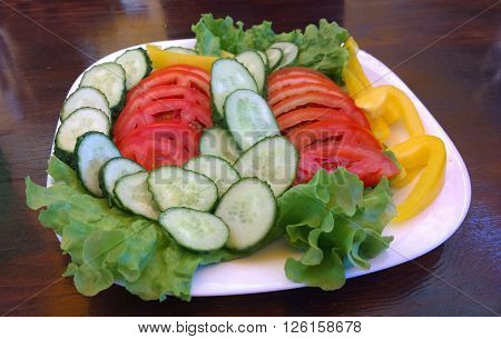 Salad of summer vegetables in a plate