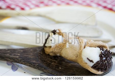 sicilian cannolo filled with cream of fresh sheep's-milk ricotta and chocolate