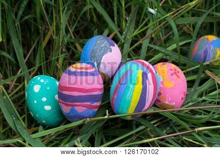 Easter eggs in Green Grass. Selective focus.