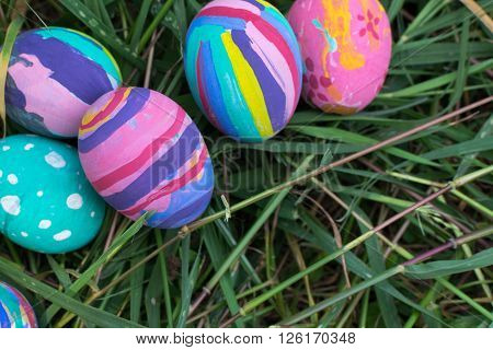 Easter eggs in Green Grass. Selective focus.