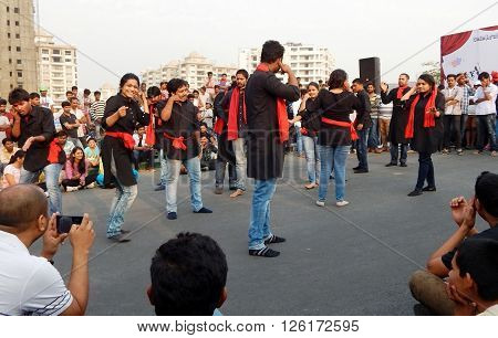 HYDERABAD,INDIA-MARCH 27:Nishumbita theatre group perform street play theme of Driving safe on road during raahgiri open road event on March 27,2016 in Hyderabad,India