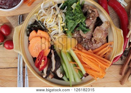 Bibimbap korean food is delicious placed on wood background