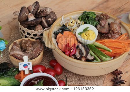 Bibimbap korean food is delicious placed on wood background
** Note: Visible grain at 100%, best at smaller sizes