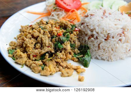 Rice topped with stir-fried pork and basil
