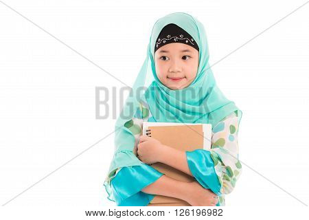 Close up of cute muslim girl on white background isolated.