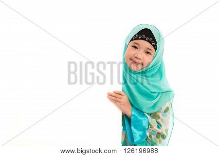 Close up of cute muslim girl on white background isolated.