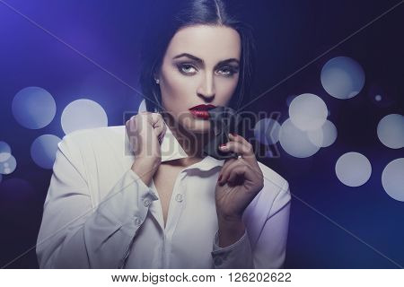 Sexy woman undress at night vintage style bokeh background