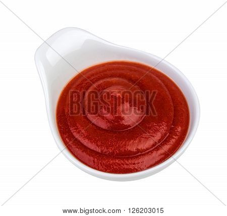 tomato sauce in bowl isolated on white background. With clipping path.
