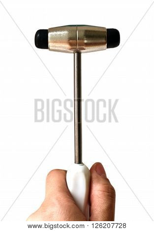 isolated hand holding a neurological hammer on white background