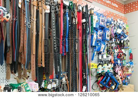 Moscow, Russia - April 16.2016. Leashes and collars in a Four paws pet store
