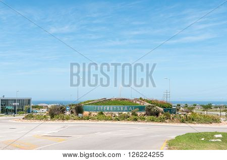 JEFFREYS BAY SOUTH AFRICA - FEBRUARY 28 2016: Traffic circle with garden and fountain at the entrance of Jeffreys Bay