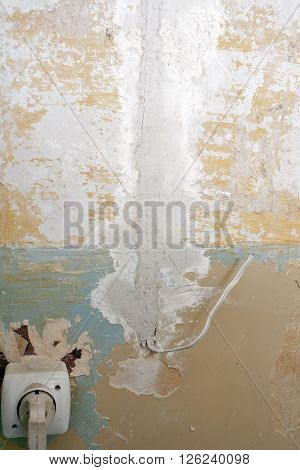 Immurement household electrical wires into the wall during repair work