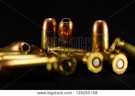 380 Auto bullets on black counter black background selective focus background