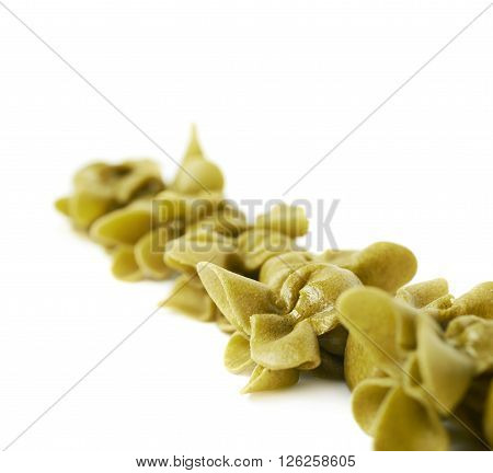 Line of sacchettoni stuffed sacchetti pasta isolated over the white background