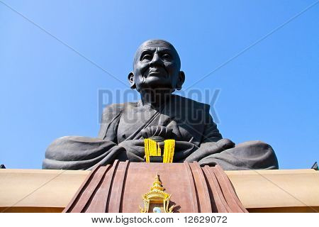 Munk Statue
