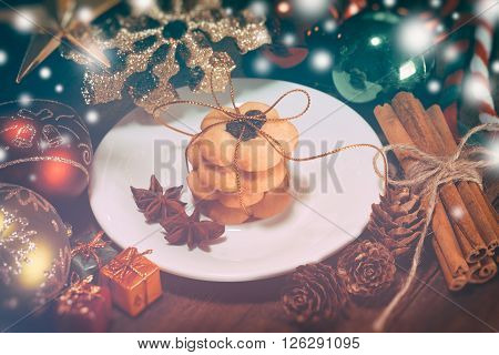 selective focus of christmas cookies on the dish vintage toning