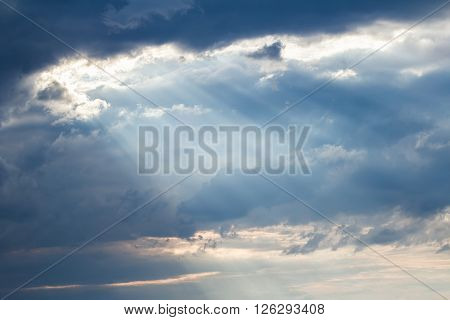 Sunset crepuscular rays are pouring though scattered clouds
** Note: Visible grain at 100%, best at smaller sizes