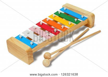 Rainbow xylophone and mallets on white background