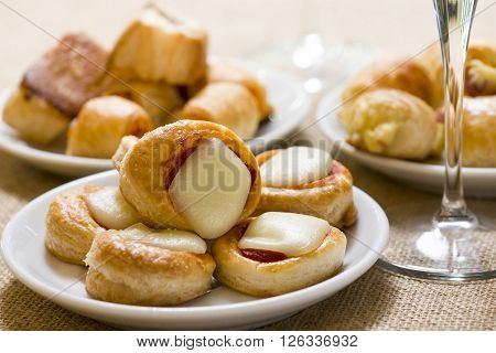 pizzette and other variety of  appetizers on plate