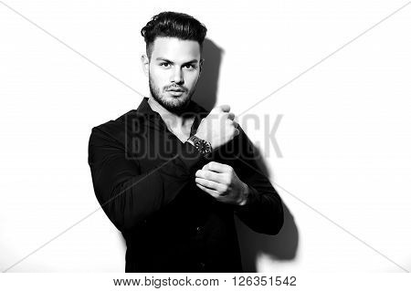 handsome young man in business man wearing a wristwatch