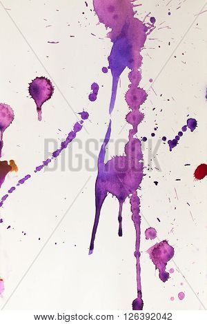 colorful watercolor stains and streaks on a white background