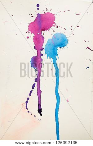 colorful watercolor stains and streaks on a white background