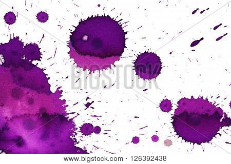 colorful watercolor stains and streaks on a white background
