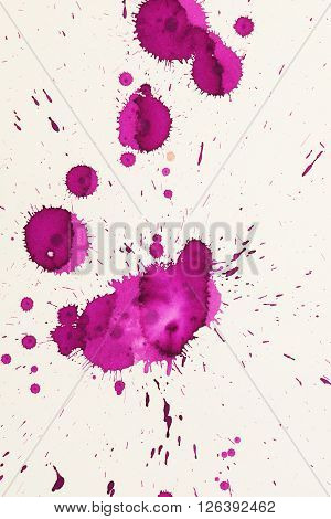 colorful watercolor stains and streaks on a white background
