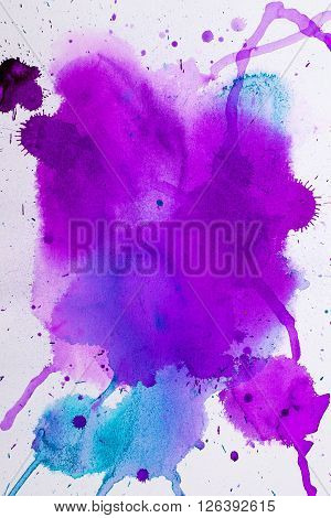 colorful watercolor stains and streaks on a white background