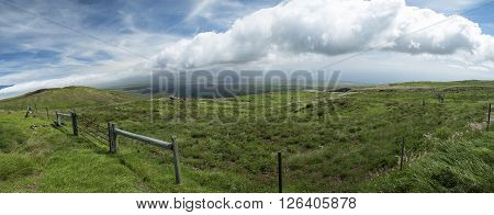 A fence and surrounding view near Kohala Mountain Road on the big island of Hawaii United States.