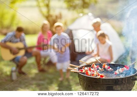 barbecue and family on camping in nature