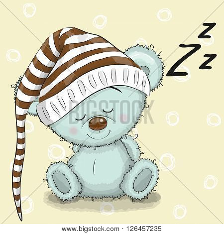 Sleeping cute Teddy Bear in a hood on a white background