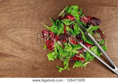 Fresh Salad With Mixed Greens Arugula, Mesclun, Mache Healthy Food.