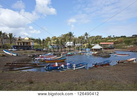 HANGA ROA, EASTER ISLAND, CHILE - APRIL 6, 2016: Fishing boats in a small harbour in HANGA ROA, capital of Easter Island.