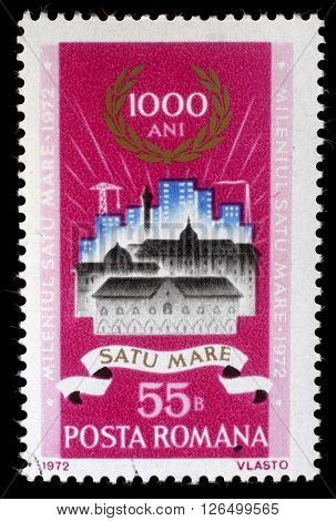 ZAGREB, CROATIA - JULY 08: a stamp printed in Romania shows Old and new buildings in Satu-Mare, Satu-Mare milenium issue, circa 1972, on July 8, 2012, Zagreb, Croatia