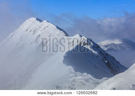The Moldoveanu Peak in winter. Fagaras Mountains Romania