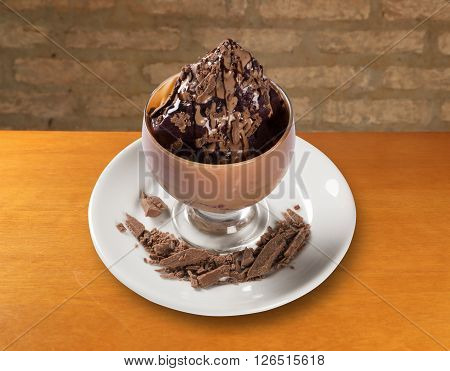 Bowl of fresh Brazilian acai. Wood background.