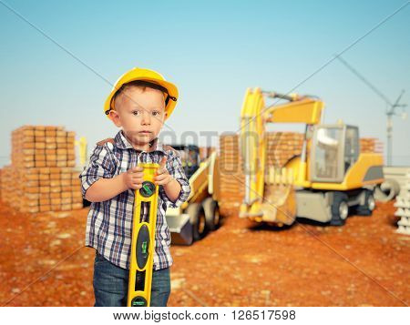 little handyman at construction site