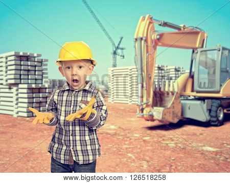 little handyman at construction site