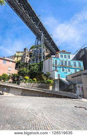 City of Porto in Portugal. Ponte Luiz I Bridge over Douro river and historic architecture of the Old Town.