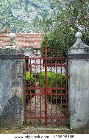 Entrance gate of the old house in Dobrota, Montenegro