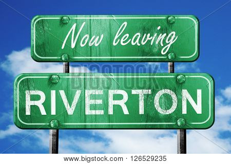 Now leaving riverton road sign with blue sky