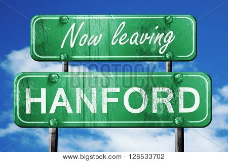 Now leaving hanford road sign with blue sky