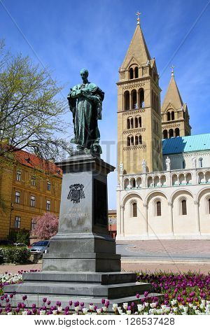 Statue of Ignac Szepesy and Basilica of St. Peter & St. Paul Pecs Cathedral in Hungary