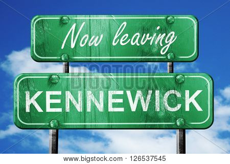 Now leaving kennewick road sign with blue sky