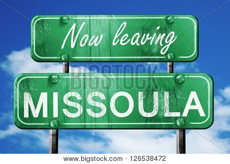 Now leaving missoula road sign with blue sky