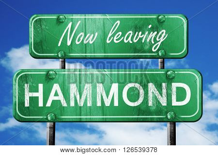 Now leaving hammond road sign with blue sky