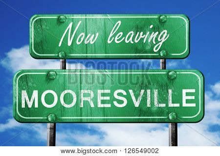 Now leaving mooresville road sign with blue sky